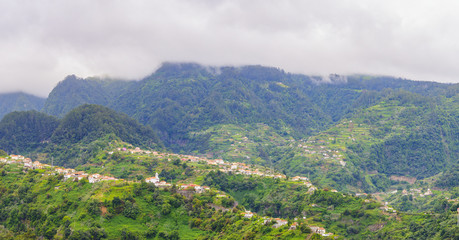 Naklejka premium Mountain landscape. View of mountains on the route Vereda da Penha de Aguia, Madeira Island, Portugal, Europe.