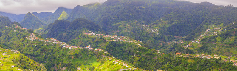 Fototapeta na wymiar Mountain landscape. View of mountains on the route Vereda da Penha de Aguia, Madeira Island, Portugal, Europe.