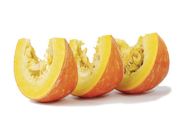 slices of sliced pumpkin on white background