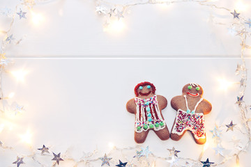 Male and Female Christmas Cookies with garland.