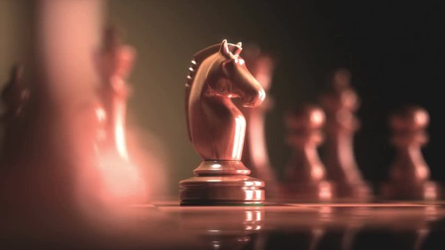 The Knight in highlight. Pieces of chess game, image with shallow depth of field.