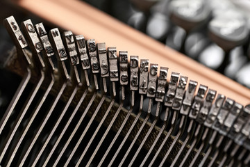 Retro typewriter in studio. Macro close up.