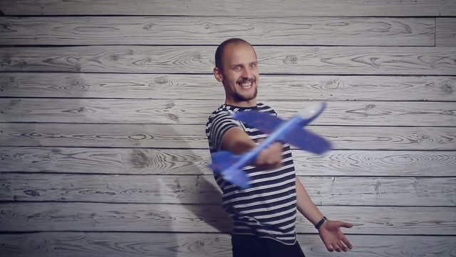 man playing with the plane
