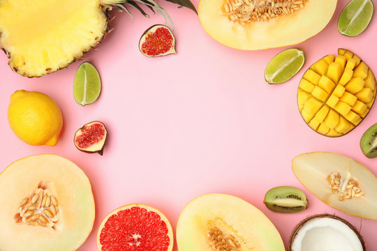 Frame made of melon, other fruits and space for text on color background, top view