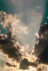 Sun and sun ray with clouds