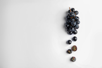 Fresh ripe juicy grapes on white background, top view