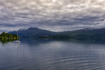 Fototapeta na wymiar Sailboat on Loch Lomond, Scotland