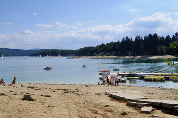Fototapeta na wymiar View of beach and coastline and boats waiting for people View of beach and coastline and boats waiting for people