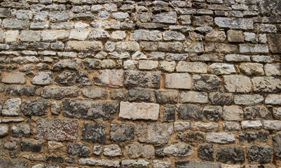 Abstract background of stone wall texture.