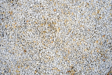 Texture of fine crushed stone of light orange color