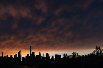 Fototapeta premium Skyline silhouette New York City Manhattan sunset golden hour USA
