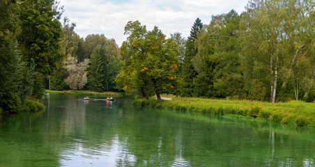 park panorama with the small river in the city of Pavlovsk