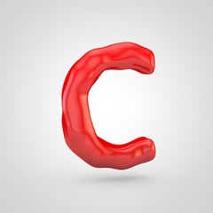 Red plasticine letter C uppercase isolated on white background.