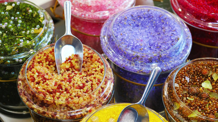 bath salts soaks closeup bathsalt in various scents in jars at shop store