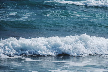 Angry sea waves rolling towards the beach