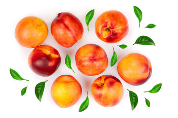 ripe nectarine with leaves isolated on white background. Top view. Flat lay pattern