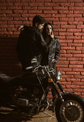 Fototapeta na wymiar couple in love. sexy couple in love. couple in love at motorbike. road trip of couple in love. Relationship.