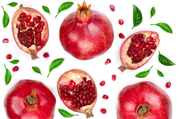 pomegranate with leaves isolated on white background. Top view. Flat lay pattern