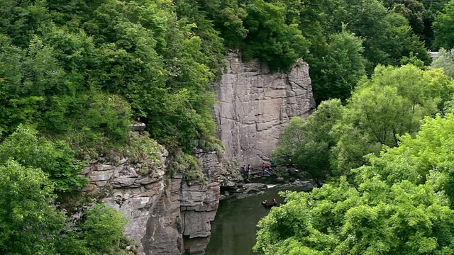 climbers to conquer the rock above the river, rock above the river, alpinists before climbing, climbers in buky canyon, climbing in a gorge above the river, ukraine buki canyon