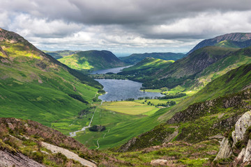 The view towards Buttermere from between Striddle and Green Crag showing Buttermere Lake and Crummock Water in the English Lake District, Cumbria, England