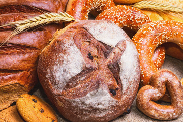 Fresh bread and bakery in the form of background, close-up and with selective focus