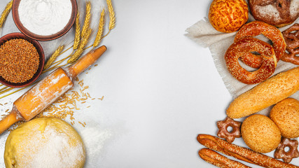Fresh bakery products and ingredients for his cooking, banner with space for text, top view