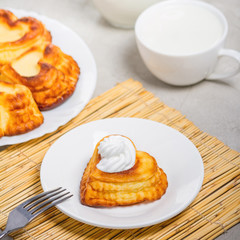 Cheese curd dish for breakfast - sweet cottage cheese pancakes, syrniki, curd fritters, selective focus