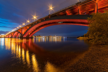 Reflection of the Communal Bridge in the Yenisei river, Krasnoyarsk, Russia. Urban landscape