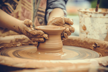 Hands of a potter at work