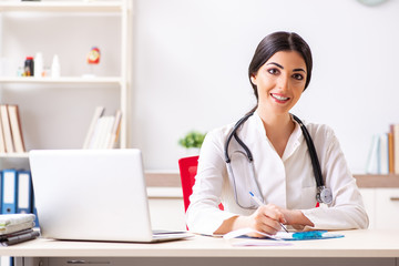 Woman doctor working in the hospital