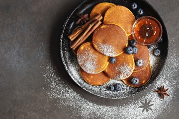 Pumpkin pancakes with fresh bluberry.