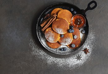 Pumpkin pancakes with fresh bluberry.