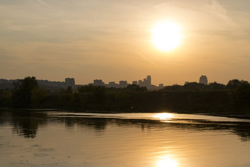 Naklejka premium sunset on the river