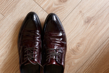 A pair of brown leather shoes