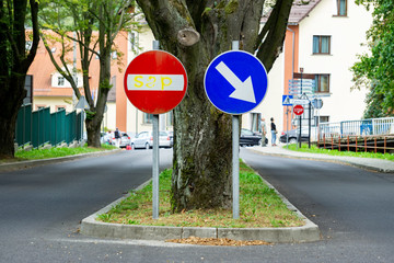 Curved Road Traffic Sign on the road at country side