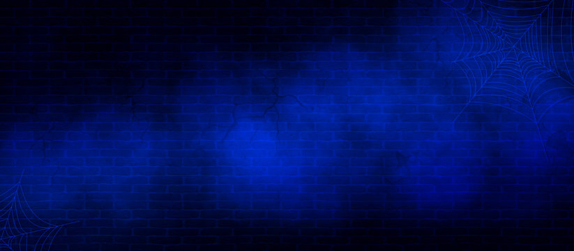 Blue brick wall background in cracks, with smoke, spider web