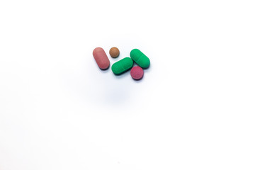Medications in the form of tablets for oral use.