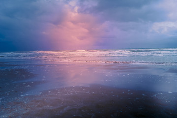 beach at blue hour on a bad weather day