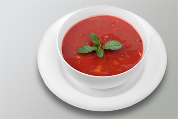 Vegetable soup isolated on a white background