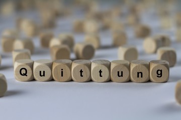 Obraz premium Quittung - Holzwürfel mit Buchstaben