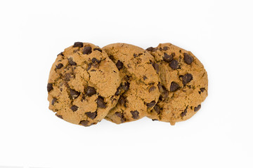 three cookies with a chocolate crumb the top view on a white background isolated