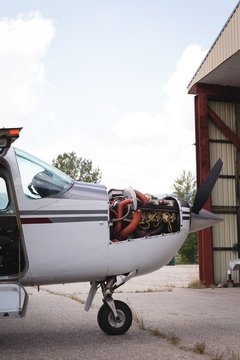 Aircraft engine in aerospace near hangar