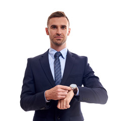 business, people and office concept - happy smiling businessman in suit