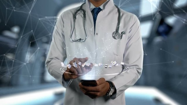 Abdominal aortic aneurysm - Male Doctor With Mobile Phone Opens and Touches Hologram Illness Word