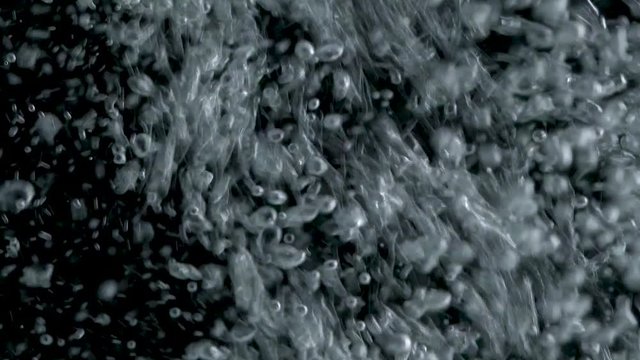 Bubbles rising to the surface on black backgrounds