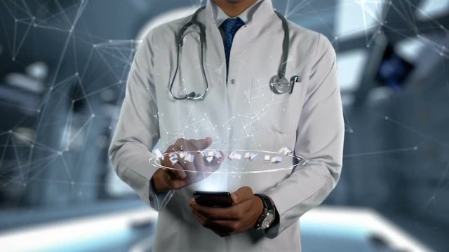 Acute myeloid leukaemia - Male Doctor With Mobile Phone Opens and Touches Hologram Illness Word