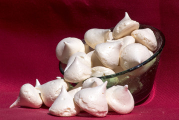 Green bowl of meringues