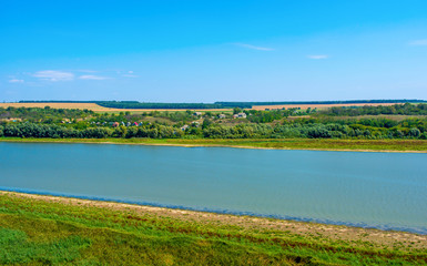 Fototapeta na wymiar Photo of big river in Khotyn, view from beach