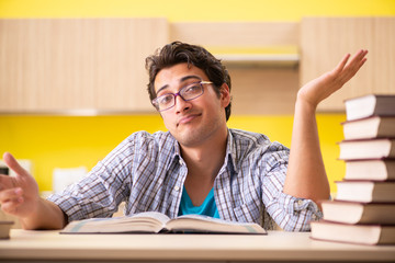 Student preparing for exam sitting at the kitchen 