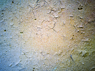 Close-up  of cracked paint on  metal wall